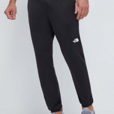 The North Face pantaloni de trening Reaxion culoarea negru, neted