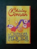 SHIRLEY CONRAN - IN CAUTAREA FERICIRII