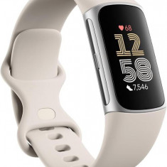 Bratara fitness Fitbit Charge 6, GPS + GLONASS, Rezistenta la apa 50M, Bluetooth, NFC (Argintiu)