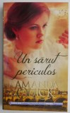 Un sărut periculos - Amanda Quick - Carte romantică, stare bună/foarte bună