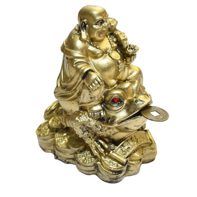 Buddha auriu pe broasca norocoasa foto