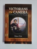 Cumpara ieftin VICTORIANS IN CAMERA - ATELIERELE FOTOGRAFICE IN SECOLUL AL XIX-LEA, RECUZITA!