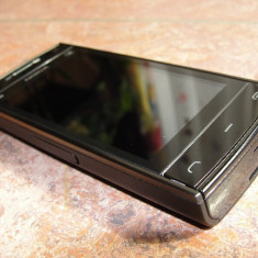 Telefon Nokia X6, folosit
