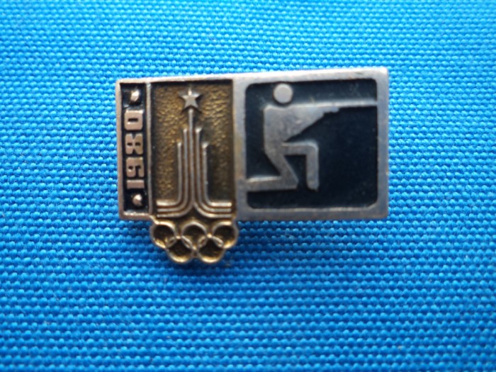INSIGNA OLIMPIADA DE LA MOSCOVA 1980-TIR/RUSIA