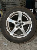 4 jante de aliaj pe 16 cu anvelope de iarna 205/60/16 folosite pe Nissan Juke d