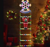 Cumpara ieftin Decoratiune Mos Craciun Pe Scara, Cu Model Fulg de nea, Pentru Exterior Si Interior, 25x165 cm, Cu Lumina Led, 8 Jocuri, Conectare La Priza, Multicolo