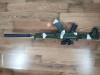 Pusca Airsoft AK47 Kalashnikov Camuflaj 1.20m, Laser, 500 Bile, Arc/Spring, ABS, 400fps, Repetitie, Cadou! 