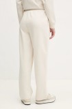 Puma pantaloni de trening femei, culoarea bej, neted, 629774