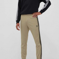 adidas Originals pantaloni de trening culoarea bej, cu imprimeu