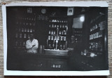 Traian Aiteanu in interiorul farmaciei omonime, Caracal anii &#039;30// fotografie