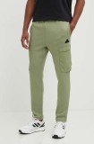 adidas pantaloni de trening City Escape culoarea verde, cu imprimeu, IV7419