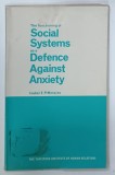 THE FUNCTIONING OF SOCIAL SYSTEMS AS A DEFENCE AGAINST ANXIETY by ISABEL E. P. MENZIES , ANII '60