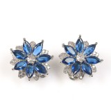 Cercei clips floare cu pietre albastre