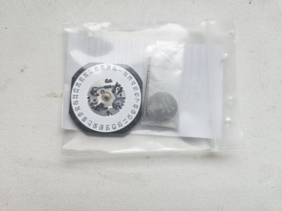 Mecanism de ceas VX3KE ,data ora 3 NOU . Stanga sau remontor inclusa . foto