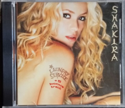 CD Shakira &amp;lrm;&amp;ndash; Laundry Service + bonus foto