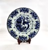 Farfurie decorativa DELFT lucrata manual diametrul de 34 de cm monocrom albastru decor rustic pasari flori