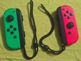 Set controllere originale Nintendo Switch Joy-Con Neon Green / Neon Red