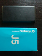 Vand telefon Samsung Galaxy J5 foto