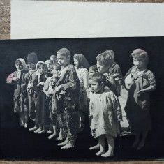 Copii in zdrente// fotografie de presa din perioada comunista, editata