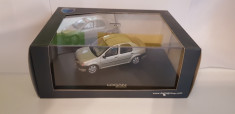 Macheta DACIA LOGAN 2006 CREM 1/43 foto