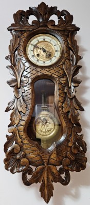 Ceas de perete cu pendul Kienzle foto