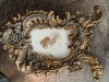 Superba rama din bronz aurit, dimensiuni aprox . 30 cm x 19 cm .Vechime 100 ani.Are o superba patina a timpului.