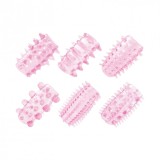 Kit manșoane pentru penis TOYZ4LOVERS Pleasure, pentru stimulare intensă și &icirc;ngroșare, cu 6 tipuri de striații, roz transparent