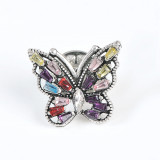 Brosa martisor fluture argintiu cu aripi multicolore
