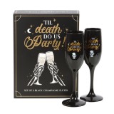 Set elegant Pahare de șampanie, &icirc;n nuanțe sofisticate de negru și auriu.