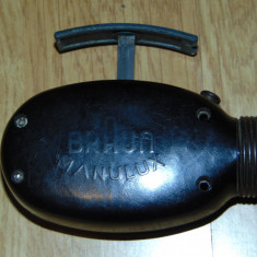 Lanterna de buzunar Marca Braun Manulux actionata mecanic anii 40