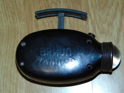 Lanterna de buzunar Marca Braun Manulux actionata mecanic anii 40 foto