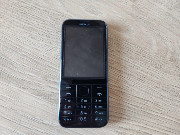 Telefon Nokia 225 negru folosit RM-1011 RM-1012 codat orange