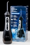 Cumpara ieftin Irigator bucal Alinty AT77, 2000 pulsatii/minut, 5 capete pentru dus bucal, 3 viteze, rezervor 200ml, incarcare USB, negru