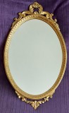 Oglinda ovala vintage din cristal, rama aurie lemn cu ornamente Rococo 97 x 56cm