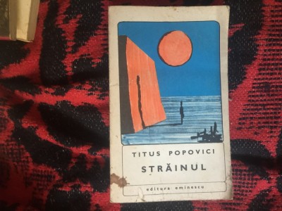 e1 Strainul - Titus Popovici foto