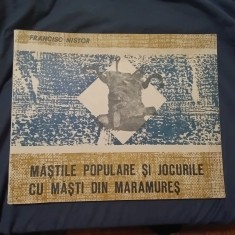 Carte Mastile populare si jocurile cu masti din Maramures de Francisc Nistor anul 1973 / 156 pagini