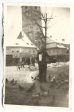 M1778N Firmele de l&acirc;ngă Turnul Sfatului din Piața Mare, Sibiu, anii 1930