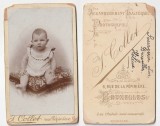 Fotografie cartonata, bebelus, atelier J. Collet, inceput de sec. 20, dimensiuni cca. 6.6cmx10.7cm