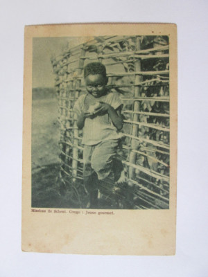 Carte postala Congo Belgian:copil gurmand,necirculată cca.1910 foto