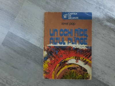 Un ochi ride,altul plinge de Ionel Pop foto