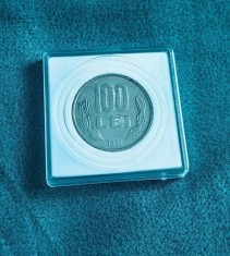 Moneda 100 de lei foto