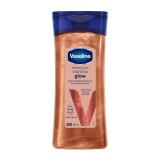 Ulei de corp Vaseline Vanilla Glow, cu unt de cacao, aromă de vanilie și particule strălucitoare, 200 ml
