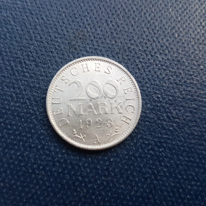 E324-Moneda 200 Marci Deutches Reich 1923 aluminu 2.2 cm stare buna.
