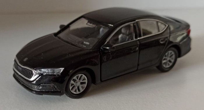 Macheta Skoda Octavia 4 sedan negru - Welly 1/36