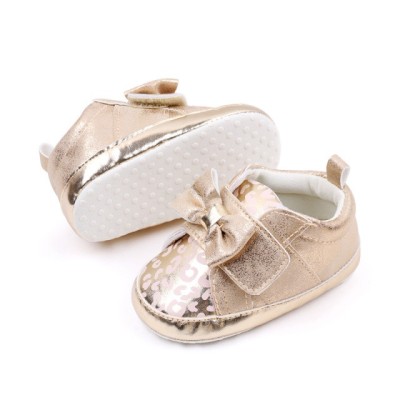 Pantofiori aurii cu imprimeu si fundita (Marime Disponibila: 9-12 luni (Marimea foto