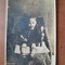 Fotografie tip carte postala, copil pe scaun, perioada interbelica