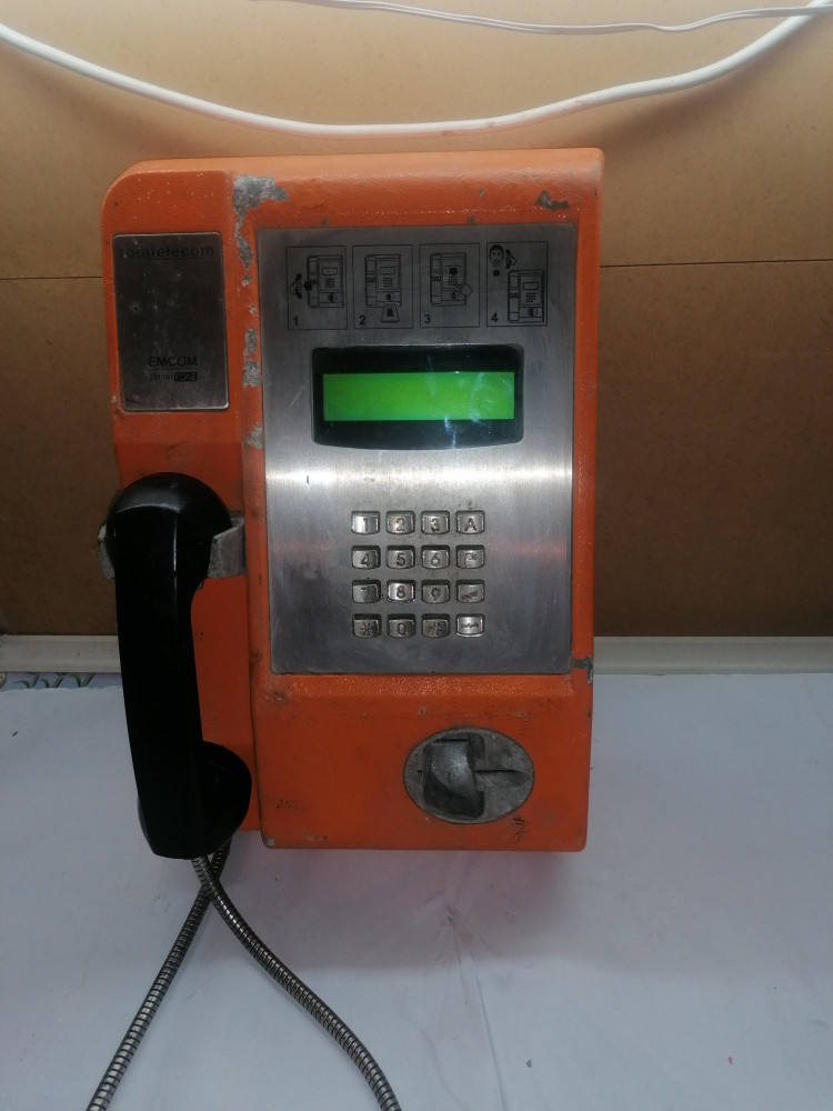 Telefon public portocaliu cu cartela | arhiva Okazii.ro