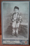 Fotografie pe carton, baiat in costum popular, perioada interbelica