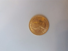 Moneda de aur foto