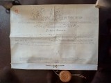 NI515 Diploma cu pecete at&acirc;rnată, pe pergament, doctor &icirc;n științe juridice a senatorului Augustin Bardoși, Universitatea Franz Joseph din Cluj, 1909